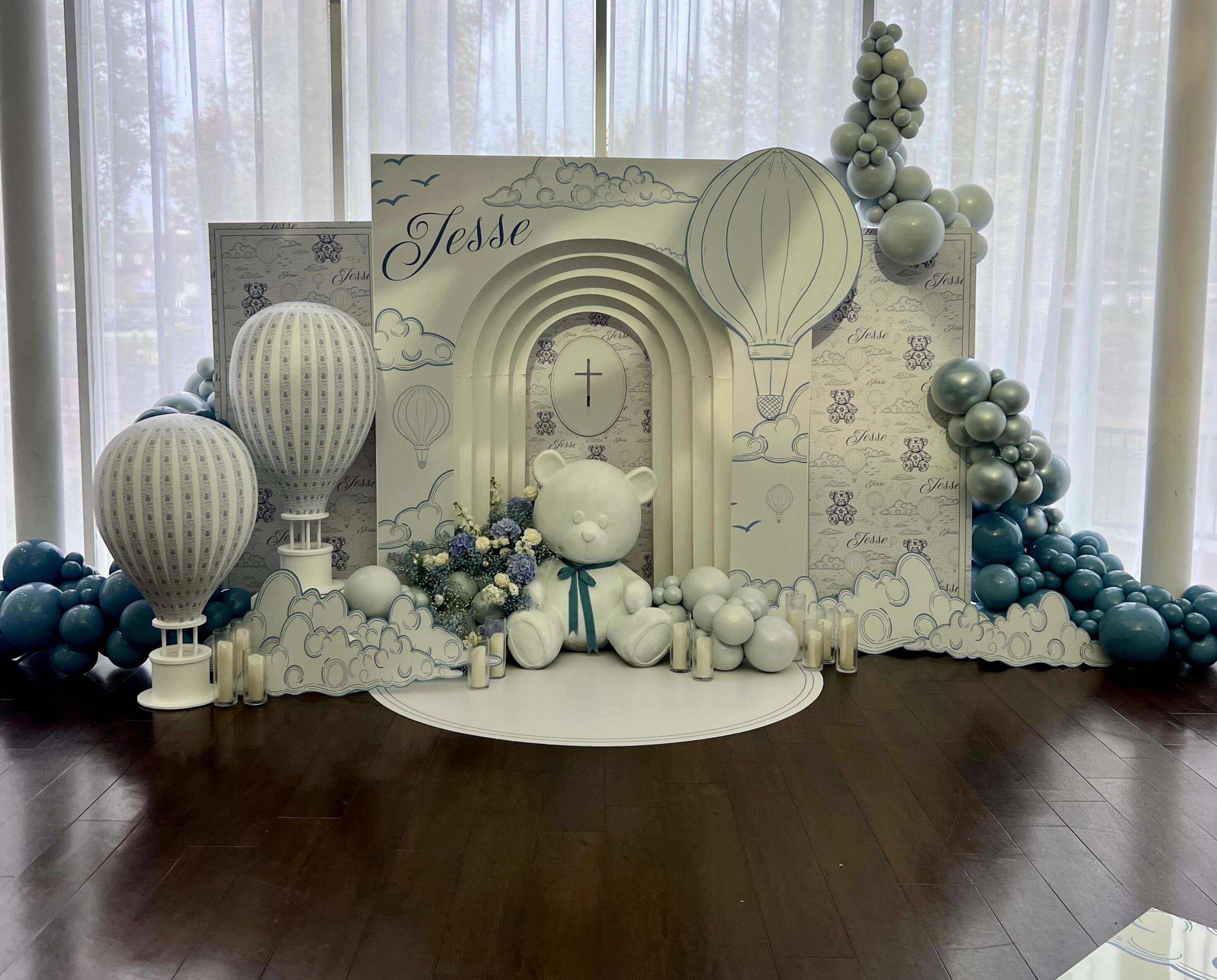 Hot air balloon themed christening with sage green and cream decor