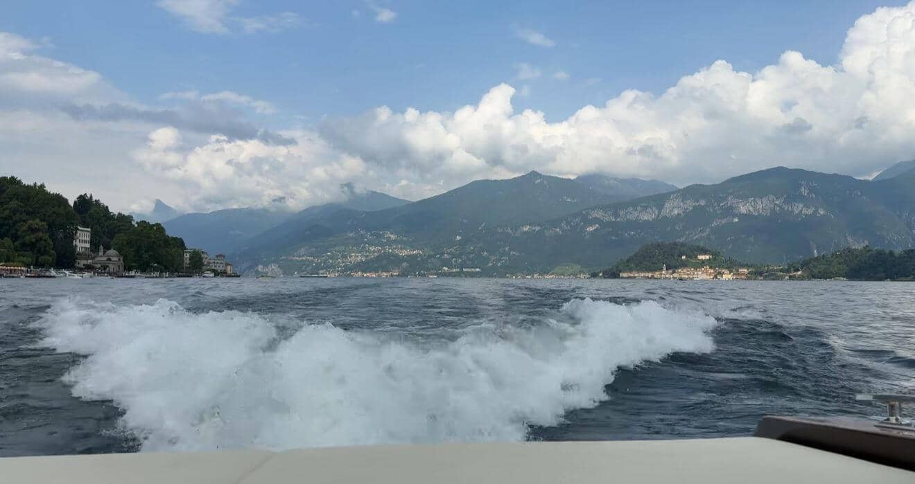 Romantic boat ride on Lake Como with mountain views - destination wedding