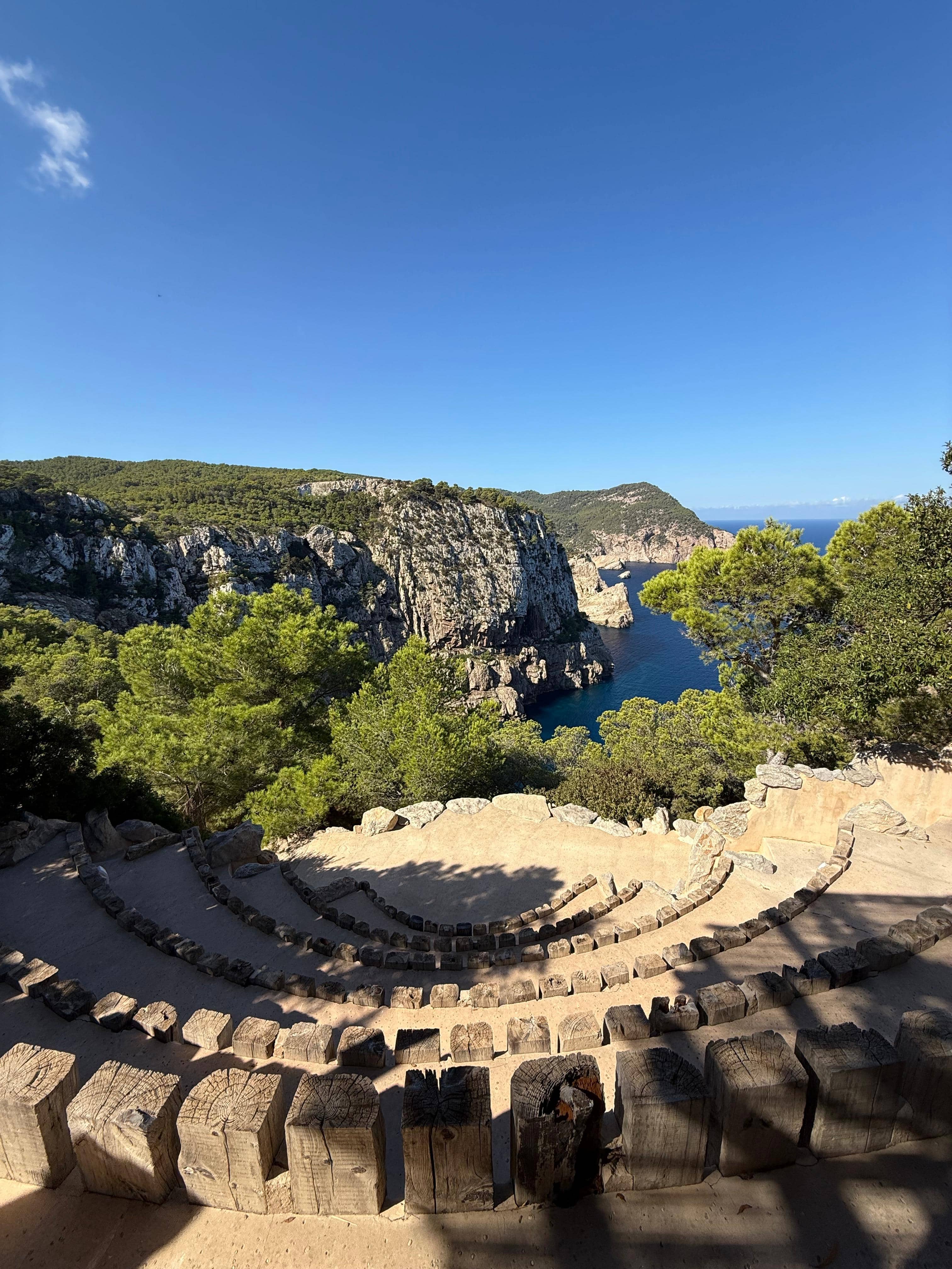 Stunning Mediterranean destination wedding venue with dramatic coastal cliff views and outdoor ceremony seating